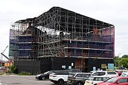 Still permanently covered in scaffolding is Castle Buildings in Kingston upon Hull, located just off off Castle Street, now part of the A63, which has been heavily torn up for roadworks. Plans for this building are very unclear, as opposed to the former Earl de Grey that was located nearby.
