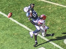 Douglas attempting a catch vs. the Browns in 2015 Cleveland Browns vs. Tennessee Titans (21588556075).jpg