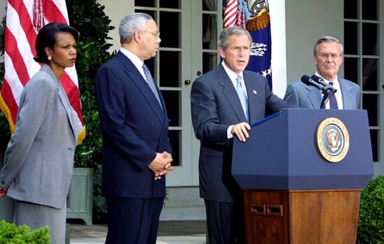 Rice and Powell (on the left) are considered black in the US. Bush and Rumsfeld (on the right) are considered white.