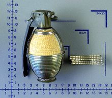 West German DM41 fragmentation grenade filled with Composition B. This example has been dissected to reveal the fragmentation sleeve and explosive charge DM41 hand grenade cutaway.png