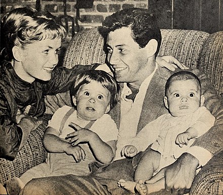 Fisher with her parents and brother in a shot taken for an issue of Modern Screen, 1958
