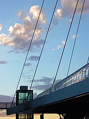 Dusk falls on the west end of Denver's Millennium Bridge. Denver millennium bridge4.jpg