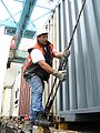 Dockworker lashing a container.jpg