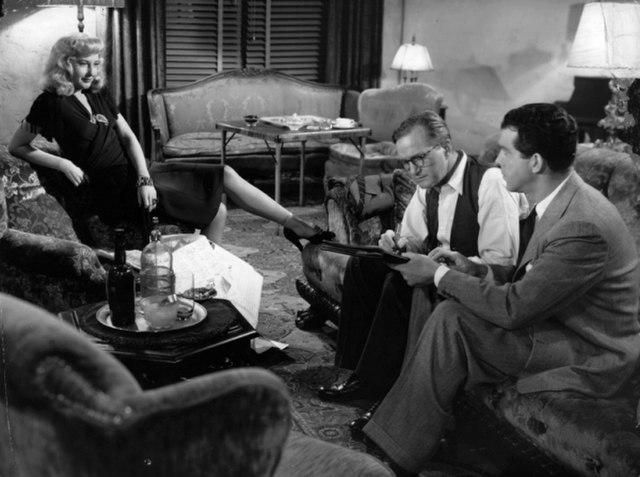 Powers with Barbara Stanwyck and Fred MacMurray in Double Indemnity (1944)