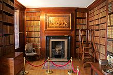 The library, with the Grinling Gibbons carving Dunham Massey 2015 56.jpg