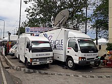 Eagle Broadcasting Corporation (Net 25) outside broadcasting vans at Quirino Grandstand, Manila, 2018 EBC (Net 25) OB vans (Quirino Grandstand, Manila)(2018-05-06).jpg