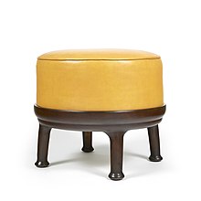 Pouf en cuir et bronze