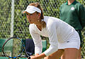 Elise Mertens competing in the first round of the 2015 Wimbledon Qualifying Tournament at the Bank of England Sports Grounds in Roehampton, England. The winners of three rounds of competition qualify for the main draw of Wimbledon the following week.