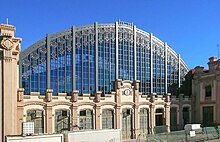 The facade, with sports hall behind