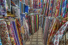 Satin fabrics on display in Souq Waqif Fabric displays in Souq Waqif.jpg