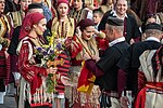 Thumbnail for File:Galichnik wedding 2023 -decorating the "bajrak".jpg