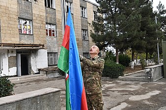 Ilham Aliyev raising the Azerbaijani flag in Fuzuli, 16 November 2020