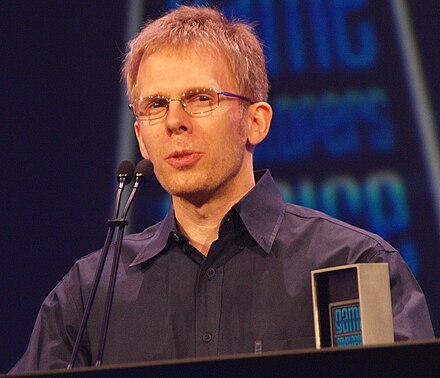 Carmack giving a speech after receiving the Lifetime Achievement Award during the 10th annual Game Developers Choice Awards ceremony on 11 March 2010