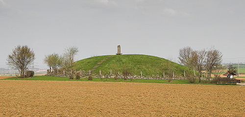 A reconstruction of the Hochdorf Chieftain's Grave, a large Iron Age burial mound dating from c. 550 BCE in Baden-Württemberg, Germany. Although constructed a thousand years before the Anglo-Saxon barrows, there are cultural similarities between the two.