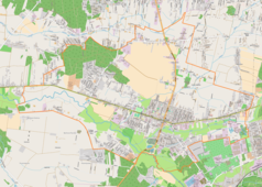 Mapa konturowa Konstantynowa Łódzkiego, blisko centrum po prawej na dole znajduje się punkt z opisem „Kościół Narodzenia Najświętszej Maryi Panny w Konstantynowie Łódzkim”