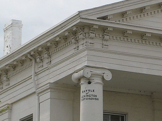 A cannonball from the 1861 Battle of Lexington is lodged in the upper left column of the Lafayette County Courthouse.