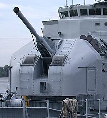 A modern naval gun turret (A French 100 mm naval gun on the Maille-Breze pictured) allows firing of the cannons via remote control. Loading of ammunition is also often done by automatic mechanisms. Maille-Braize-canon.jpg