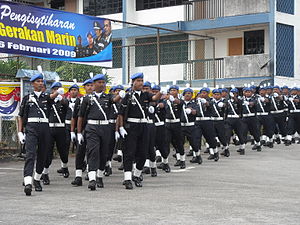 The marine police march during the declaration of PGM on 6 February 2009. The officers are wearing skyblue berets, the new berets of the unit and carried the M16 rifles. Marine Police Parade.jpg