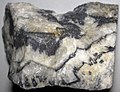 Native silver-acanthite-barite (Tertiary; Bulldog Mountain Mine, Creede Mining District, Colorado, USA) 6.jpg