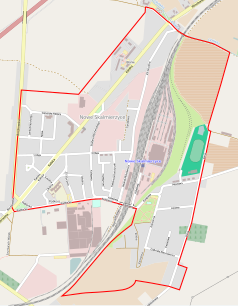 Mapa konturowa Nowych Skalmierzyc, blisko centrum u góry znajduje się punkt z opisem „Stary dworzec kolejowy”