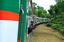 Parabat Express passing through tea garden Parabat Express 1.jpg