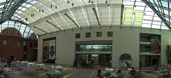 The spacious central atrium has movable solar shades (July 2013)