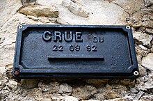 Plaque commémorative de la crue de l'Ouvèze le 22 septembre 1992.