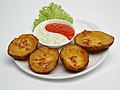 Potato skins arranged on a plate as an appetizer.jpg