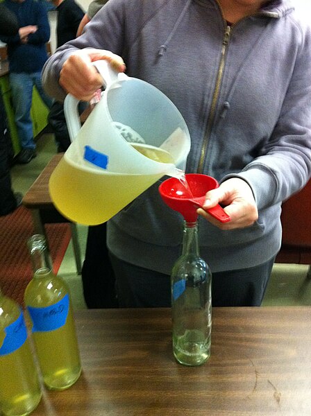 File:Preparing Chardonnay sample bottles for bench trials.JPG