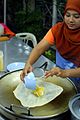 A sweet Thai roti kluai khai: similar to roti canai, it is folded around a filling of sliced bananas and eggs.