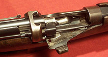 Close-up of the action on an SMLE Mk III rifle, showing the bolt head, magazine cut off, and charger clip guide. SMLEAction.jpg