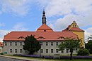 Castle complex, consisting of a fortified tower, upper office building, stables and connecting structures