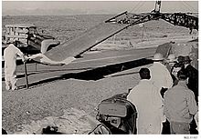 The stretcher rig. Army volunteers from a special Chemical Radiological Unit at Dugway Proving Ground practiced before a crane inserted the rig into the SL-1 reactor building to collect the body of the man (Legg) pinned to the ceiling directly above the reactor vessel.