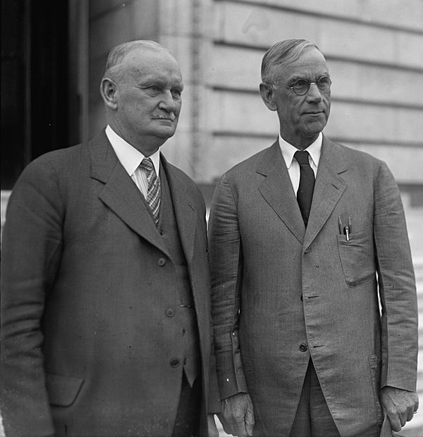 Willis C. Hawley (left) and Reed Smoot in April 1929, shortly before the Smoot–Hawley Tariff Act passed the House of Representatives