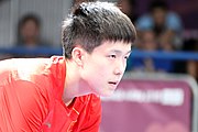 Deutsch: Tischtennis bei den Olympischen Jugendspielen 2018; Tag 9, 15. Oktober 2018; Mixed, Finale, Mixed-Doppel – Tomokazu Harimoto (JPN) Vs Wang Chuqin (CHN) 3:1 English: Table tennis at the 2018 Summer Youth Olympics at 15 October 2018 – Mixed Final, Mixed-Double – Tomokazu Harimoto (JPN) Vs Wang Chuqin (CHN) 3:1