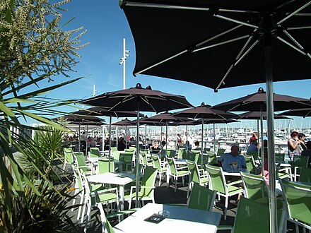 Outdoor seating of cafés and restaurants in the port