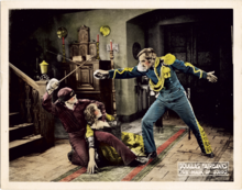 A colorized lobby card showing a scene from the film, 1920 The Mark oz Zorro lobby card.png