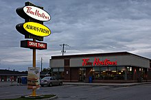 An outlet featuring the classic slogan "Always Fresh", in founder Horton's hometown, Cochrane, Ontario Tim Hortons in Cochrane, Ontario.jpg