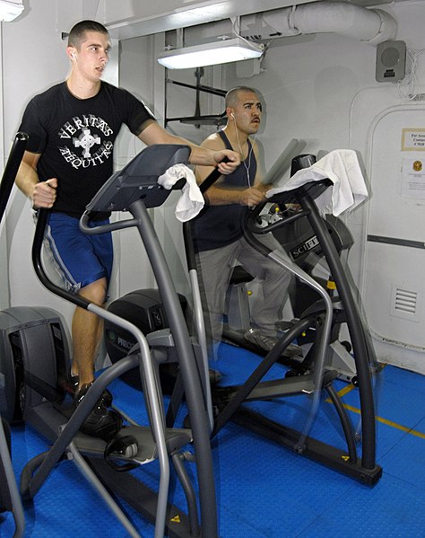 File:US Navy 070210-N-9689V-002 Damage Controlman 2nd Class Stephen Petroskey uses an elliptical trainer to test run the new cardiovascular portion of the Physical Readiness Test (PRT) aboard amphibious assault ship USS Boxer (LHD 4.jpg