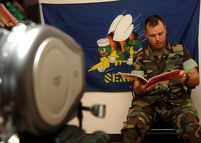 File:US Navy 080823-N-0981M-012 Religious Programs Specialist 3rd Class Kirk A. Cogswell reads.jpg