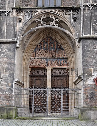 Branchwork tracery at Ulm Minster, c. 1475 Ulm Munster Passionsportal 01.jpg