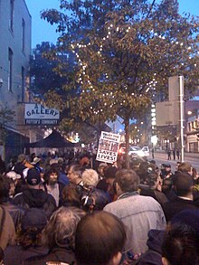 People crowd the sidewalk during a fundraiser for Insite in 2008 Vancouver crowd Insite benefit concert.jpg