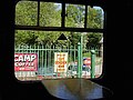 Vintage signs viewed from a vintage carriage - geograph.org.uk - 576331.jpg
