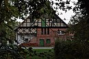 Southern farm yard of Ahlsdorf Castle with access to the castle and pond, garden of the administrator's house, castle gardening with ice cellar, village-side enclosure wall and shed