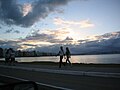 Women jogging by the water's edge, Florianópolis.jpg