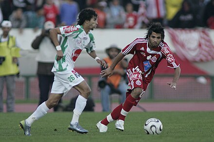 Players from Raja (left) and Wydad (right) during a Casablanca derby match in 2008