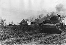 A T-26 pressed into service with the German Wehrmacht operating in the area of Lake Ilmen in 1942. Zdobyczny czolg radziecki z niemieckimi oznaczeniami na froncie w okolicach jeziora Ilmen. (2-788).jpg