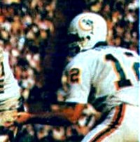 Griese playing for the Dolphins in Super Bowl VII 1986 Jeno's Pizza - 33 - Jim Kiick (Bob Griese crop).jpg