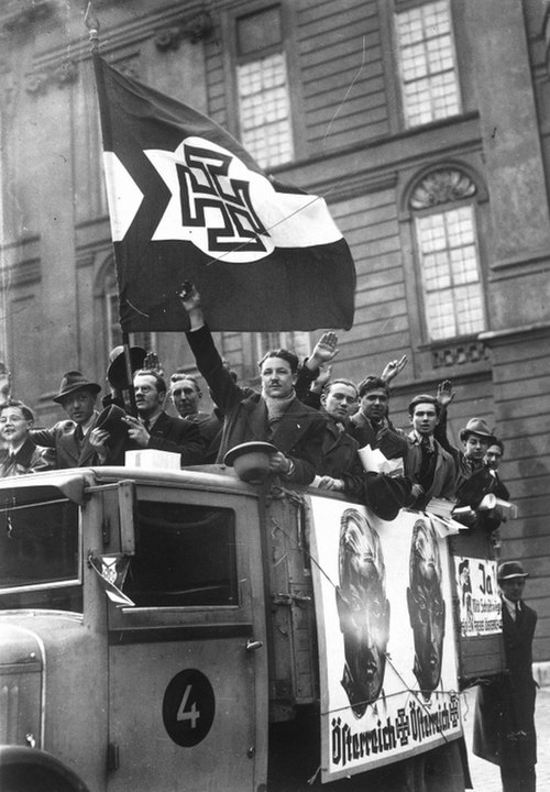 Truck with supporters of Schuschnigg (pictured on the posters) campaigning for the independence of Austria, March 1938 (shortly before the Anschluss)
