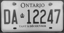 A French-language Ontario license plate. The province introduced French plates in 2008 as an alternate to its English plates. 2011 Ontario license plate DA12247 commercial TANT A DECOUVRIR.png